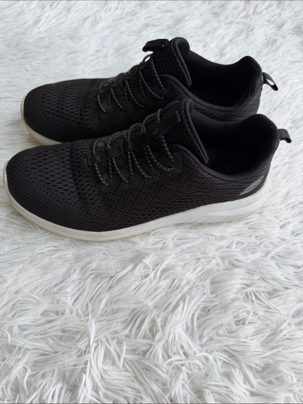 Skechers Women's Black Knit Sneakers with White Sole Accent
